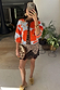 Blue Poppy Cardigan with orange poppy print and leopard trim, paired with a leopard and lace slip dress.