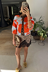 Blue Poppy Cardigan with orange poppy print and leopard trim, paired with a leopard and lace slip dress.