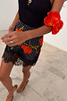 Black Poppy Mini Maeva Skirt featuring the iconic poppy print, white polka dots and black lace trim.