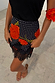 Black Poppy Mini Maeva Skirt in an iconic floral and polka dot print with a delicate black lace hem.