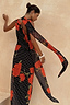 Thumbnail for Black Poppy Sophie Dress with a red poppy and polka dot print and statement multi-wear scarf detail.