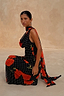 Thumbnail for Petite Black Poppy Sophie Dress with a polka dot and red poppy print featuring a trailing scarf.