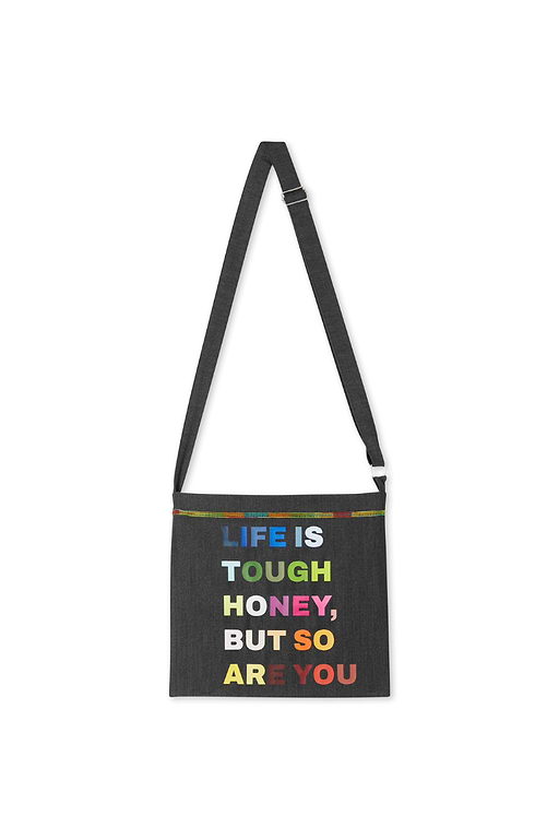 Charcoal Life is Tough Honey drainage bag with multi-coloured text and an adjustable shoulder strap.
