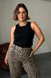 Black ribbed tank top and leopard print trousers, styled on model Pilar as an iconic London look.