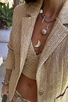 Beige Raffia Cecilia Top in a textured weave, styled with a matching blazer and shell necklaces.