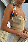 Beige Raffia Cecilia Top featuring a corset silhouette and multi-tie straps with colourful glass beads.