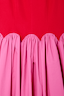Red and Pink Mini Monika Dress highlighting the scalloped edge detail and gathered pink pleated cotton skirt.