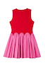 Red and Pink Mini Monika Dress featuring a red sleeveless bodice, scalloped waist and pink pleated cotton skirt.