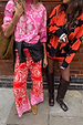 Pink Bandana Copenhagen Jumper and matching red joggers in a knit bandana print, styled for a London look.