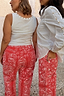 Red Bandana Jeans with a paisley print, shown on two models to highlight inclusive sizing.