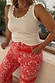 Thumbnail for Red Bandana Jeans featuring a white bandana print and a studded tank top for inclusive sizing.