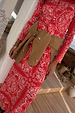 Red Bandana Rib Dorris Skirt co-ord with a matching top and a tan cardigan tied around the waist.