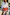 Thumbnail for Iconic red bandana Maeva mini skirt with white lace trim, styled with a white shirt and western-style belt.