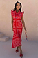 NFD Red Bandana Remi Dress with leopard sleeves and a frilled neckline, styled with a neck scarf and red floral sandals.