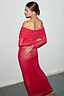 Thumbnail for Red Diaz Dress in ruched mesh with long sleeves and an off-the-shoulder neckline against a white brick wall.