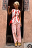Thumbnail for Cream Marina Marra Trousers with a red fish print, styled as a cotton co-ord for a vacation look.