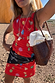 Thumbnail for Red Shell Ioana Mini Dress featuring a multicoloured shell print, styled with a woven bag for a vacation look.