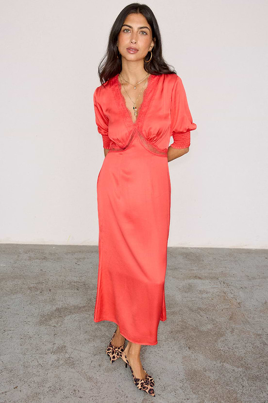 Red May Dress featuring delicate lace trim, V-neckline and short sleeves with elasticated cuffs.