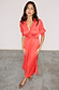 Thumbnail for Red May Dress featuring lace trim on the V-neckline and waist, paired with leopard print pointed heels.