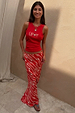 Red Snake Love Rib Tank with a graphic 'Love' snake motif, paired with a matching patterned maxi skirt.