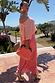 Pink and Red Jacquard Tilly Dress with gold metallic dots and off-the-shoulder detail for inclusive curve fashion.