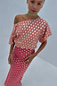 Thumbnail for Pink and Red Jacquard Tilly Dress Petite featuring shimmering gold specks and an off-the-shoulder neckline.