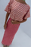 Thumbnail for Pink and red Tilly dress in gold metallic jacquard with an off-the-shoulder neckline.
