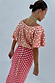 Thumbnail for Pink and red Tilly Dress in jacquard fabric with gold metallic dots and an off-the-shoulder silhouette.
