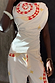 Snake Asymmetric Top with red snake print and star motifs, featuring a gathered waist and matching trousers.