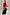 Thumbnail for Red Ribbed Tank Top wardrobe staple styled with wide-leg jeans and a patterned cardigan for a London look.