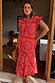 Red Bandana Remi Dress with leopard sleeves and a ruffled neckline, shown on a model for inclusive sizing.