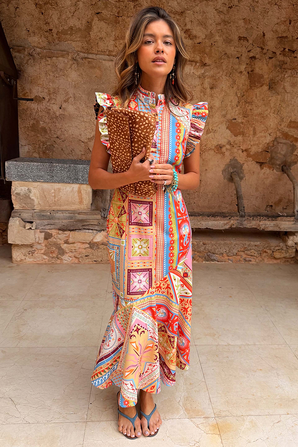 Dolce Vita Remi Dress in a colourful tile patchwork print with ruffle sleeves and high neckline.