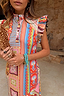 Dolce Vita Remi Dress in a sunset-toned tile patchwork print with a high neckline and ruffle sleeves.