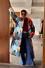 Thumbnail for Longline quilted Navy Abstract Coat featuring a colourful abstract pattern and reversible leopard print lining.