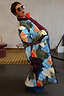 Reversible quilted Navy Abstract Coat in a multi-wear style, worn by a 5ft5’’ model in a UK size 10.