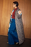 Reversible Navy Abstract Coat featuring a quilted longline design and iconic leopard print for multi-wear styling.