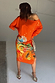 Thumbnail for Orange Rio Jem Dress with a tropical fruit print and sun motifs in a relaxed, off-the-shoulder midi silhouette.