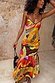Rio Laragh Midaxi Dress featuring a tropical papaya and citrus print, tiered hem and straps in a cotton-linen mix.