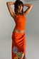 Hot Coral Ribbed Tank paired with a tropical Rio Skirt for a vibrant, feel good dressing look.