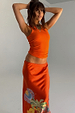 Hot Coral Ribbed Tank paired with a tropical Rio Skirt for a vibrant, feel good dressing look.