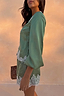 Thumbnail for Green Lace Romi Top in soft green satin with white lace trim and voluminous long sleeves.