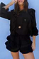 Thumbnail for Black Ruffle Shorts with tiered lace trim, styled as a co-ord with a matching long-sleeve embroidered top.