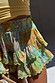 Thumbnail for Isla Ruffle Shorts in a multi-coloured hand-painted print with tiered ruffles and green scalloped lace trim.