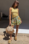 Isla Ruffle Shorts with tiered ruffles and lace trim in a hand-painted Balearic-inspired print.