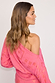 Pink Safari Mini Tilly Dress in jacquard fabric with sun and palm prints, shown from a side-back profile.