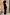 Thumbnail for Black Sapna maxi dress with ring detailing at the neckline and a fitted silhouette against a stone wall.