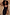 Thumbnail for Black Sapna Dress with statement tortoiseshell ring detailing at the neckline and slim straps, styled with sunglasses.