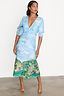 Thumbnail for Scenery May Dress Petite featuring a blue Lake Como landscape print, deep V-neckline and short ruched sleeves.