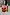 Thumbnail for NFD Eau De Parfum 002 amber glass bottle with a marbled pink cap alongside a silver 10ml travel spritz.
