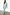 Thumbnail for Model wearing the iconic Ice Blue Sequin Jaspre Skirt with a light blue shirt and crystal-buckle heels.